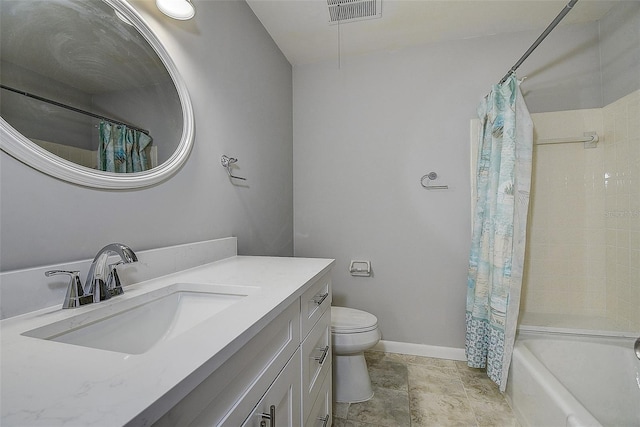 full bathroom featuring vanity, toilet, and shower / tub combo