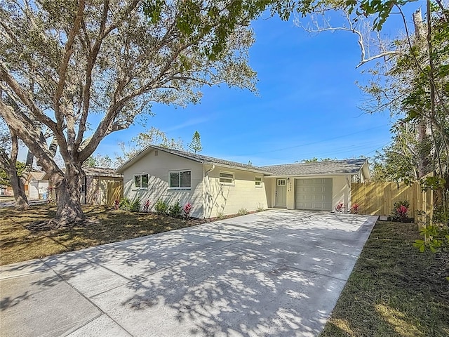 view of front of home with a garage