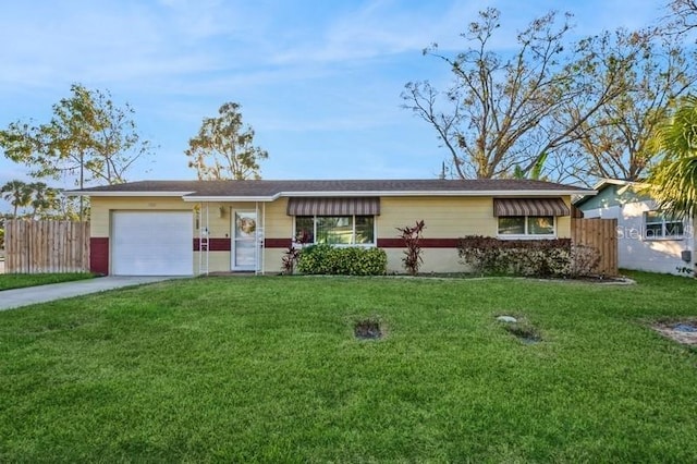 ranch-style house with a garage and a front yard