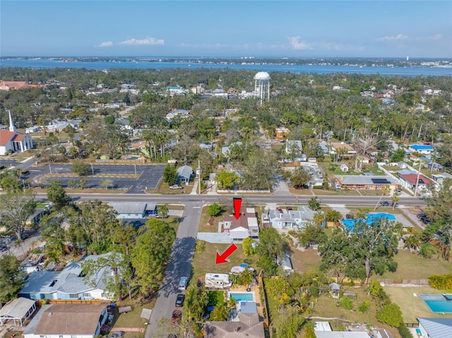 bird's eye view with a water view