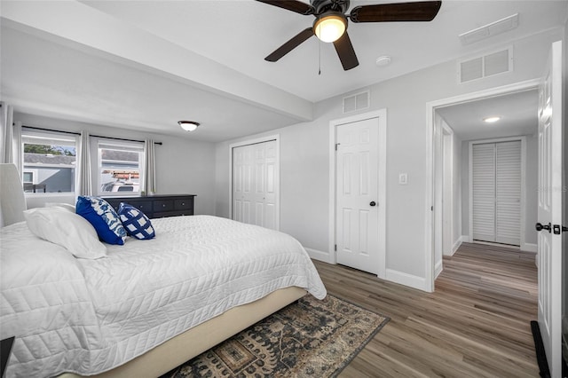 bedroom featuring wood-type flooring and ceiling fan