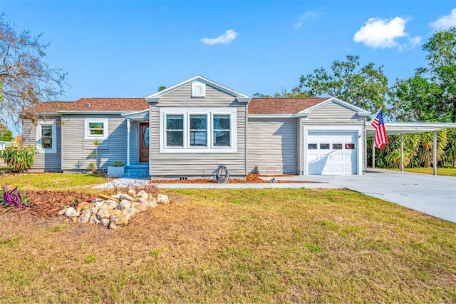 ranch-style house featuring a garage, a front yard, concrete driveway, and a carport