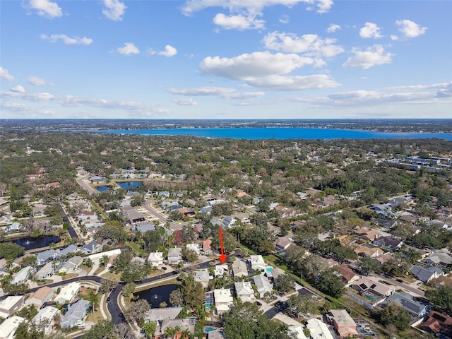 bird's eye view with a water view