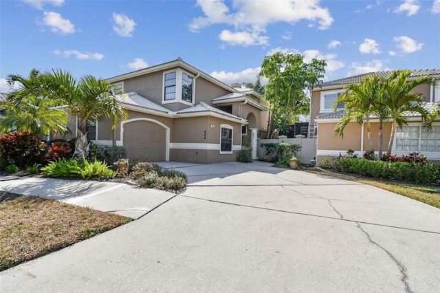 view of front of home with a garage