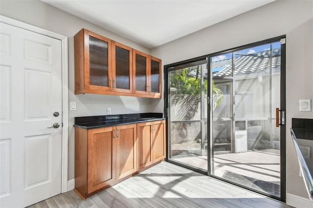 kitchen with light hardwood / wood-style flooring