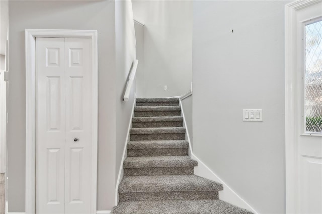 stairway with carpet flooring