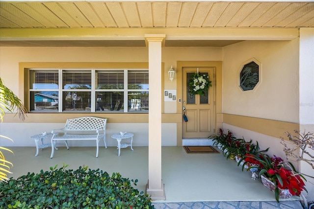 entrance to property with a porch