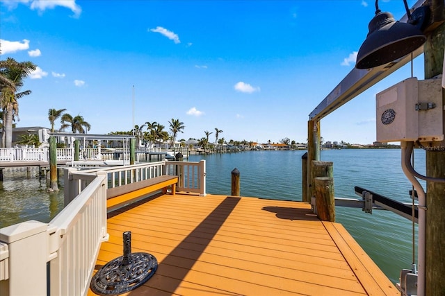 dock area featuring a water view