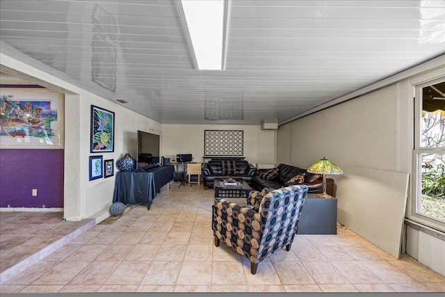 living room featuring tile patterned floors