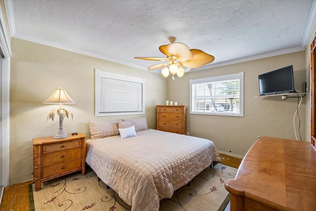 bedroom with crown molding, ceiling fan, light parquet flooring, and a textured ceiling