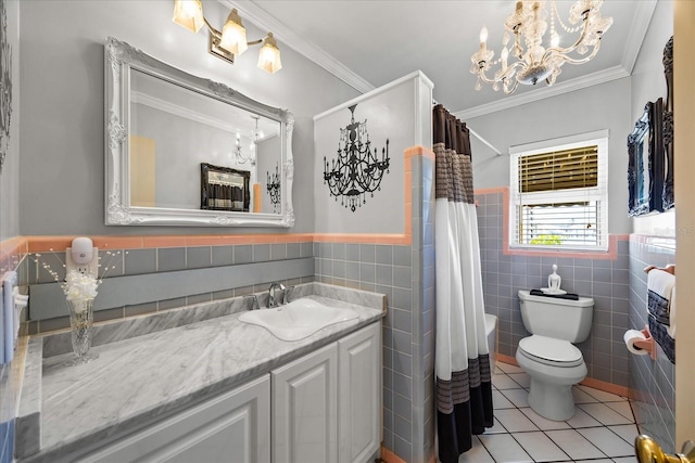 full bathroom with ornamental molding, vanity, tile patterned flooring, and tile walls