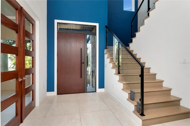 tiled entryway with french doors