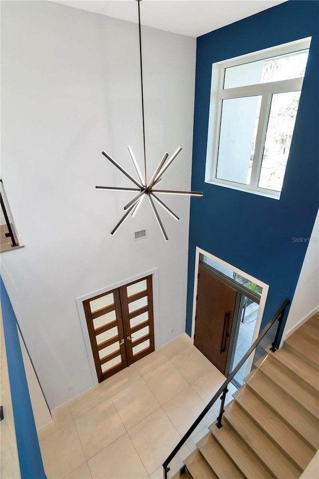 entryway with tile patterned floors