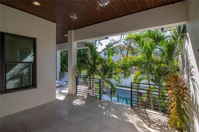 view of patio / terrace with a balcony