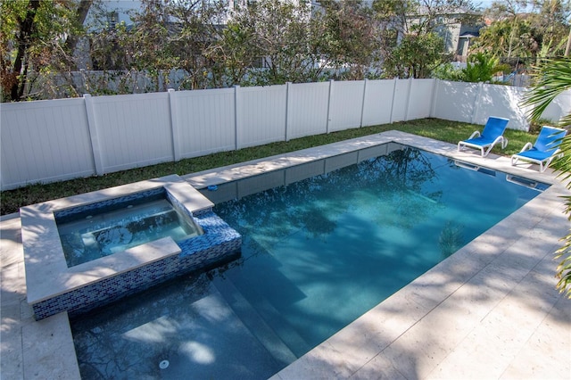 view of pool with an in ground hot tub