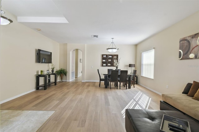 living room with light hardwood / wood-style floors