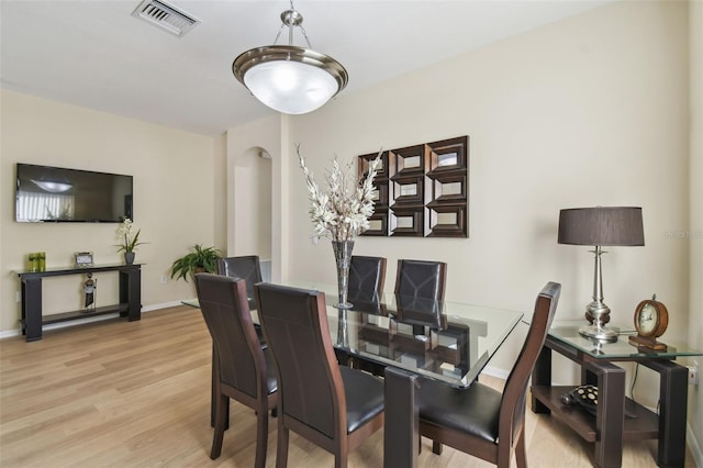 dining space featuring light hardwood / wood-style floors