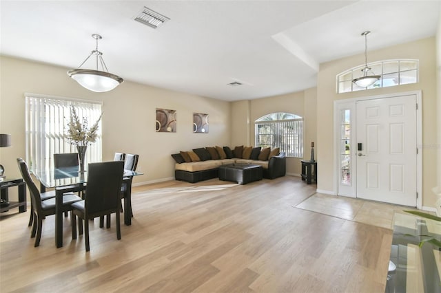 dining area with light hardwood / wood-style flooring