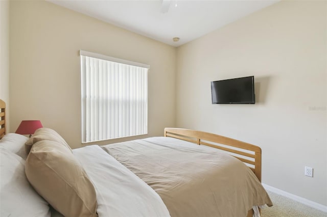 bedroom featuring carpet and ceiling fan