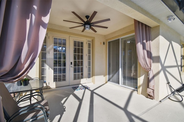 view of patio / terrace featuring french doors and ceiling fan