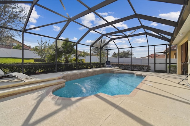 view of pool featuring a lanai and a patio area