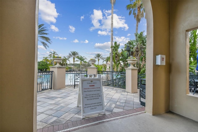 view of patio / terrace featuring a water view