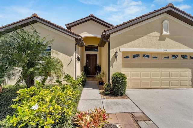 mediterranean / spanish-style house featuring a garage