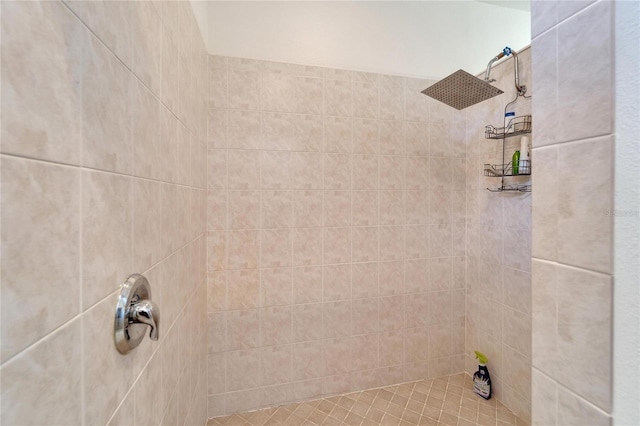 bathroom with tiled shower