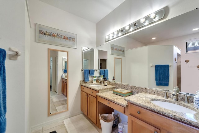 bathroom featuring vanity and tile patterned flooring