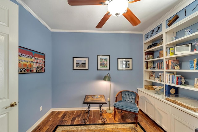 sitting room featuring hardwood / wood-style flooring, ornamental molding, and ceiling fan