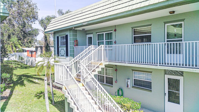 exterior space featuring a front lawn