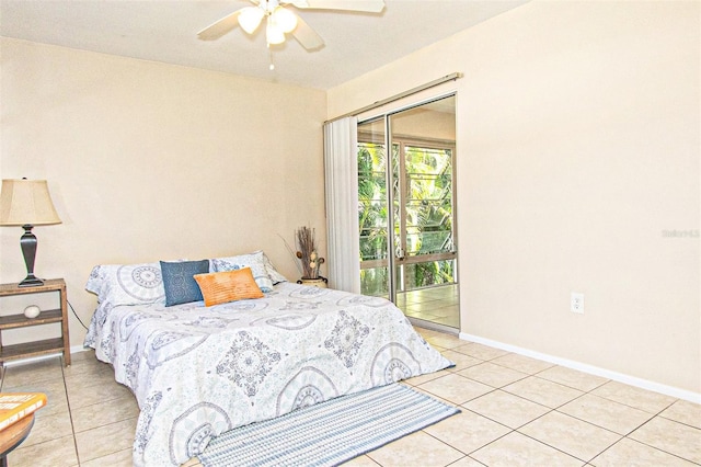 tiled bedroom with access to outside and ceiling fan