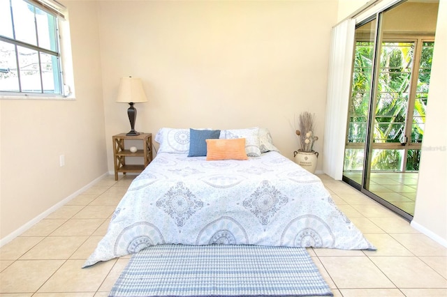 tiled bedroom with access to outside