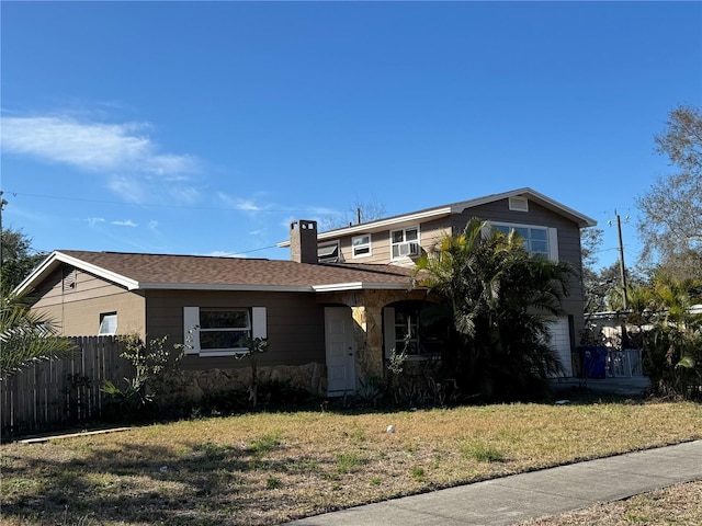 view of front of home with a front lawn