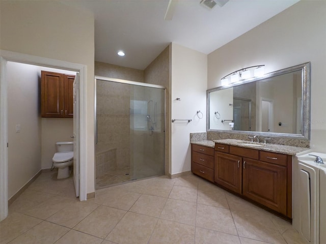 full bath with visible vents, toilet, a shower stall, vanity, and tile patterned floors