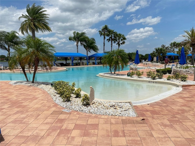 community pool with a patio