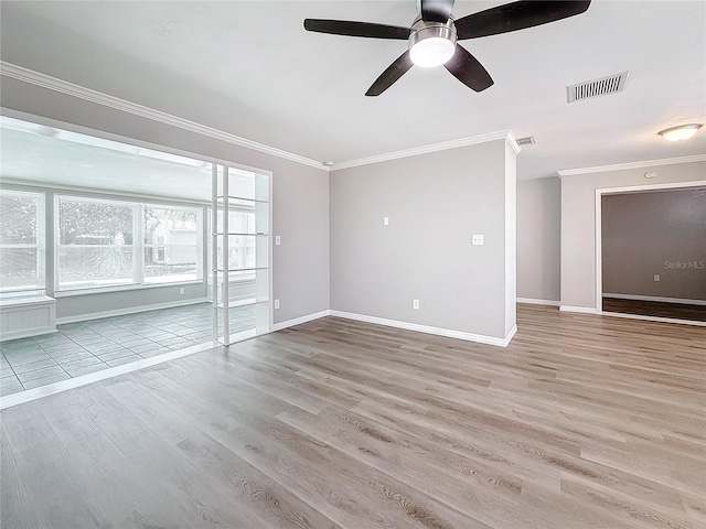 unfurnished living room with ceiling fan, ornamental molding, and light hardwood / wood-style floors