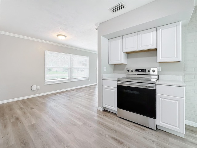 kitchen with white cabinetry, stainless steel electric range oven, crown molding, and light hardwood / wood-style flooring