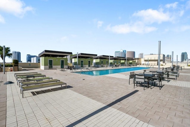 view of pool featuring a patio