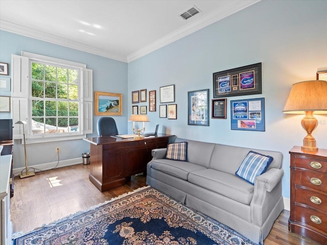 office area featuring ornamental molding and hardwood / wood-style floors