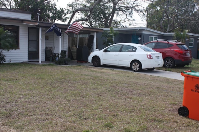 exterior space with a front lawn