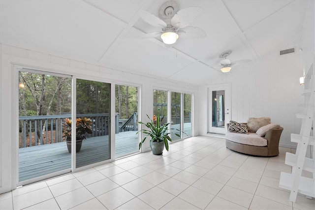 unfurnished sunroom with ceiling fan