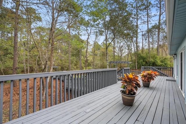 wooden deck with a pergola