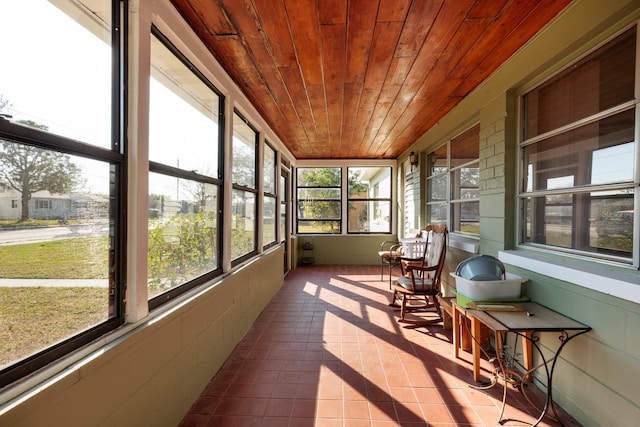 sunroom / solarium with wood ceiling