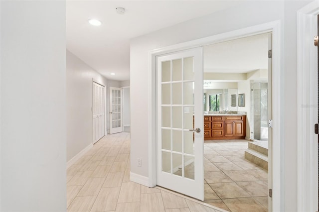 corridor featuring french doors