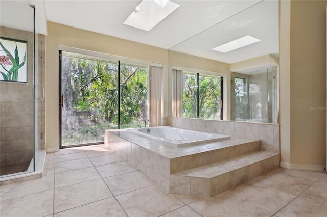 bathroom with tile patterned flooring, a skylight, and plus walk in shower