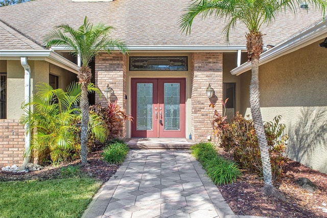 property entrance featuring french doors