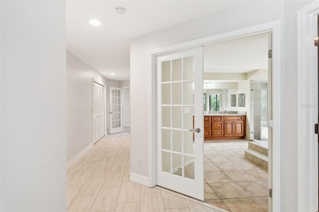 70 Deerpath Dr, Oldsmar, FL 34677 - hall featuring light tile patterned flooring, recessed lighting, and baseboards