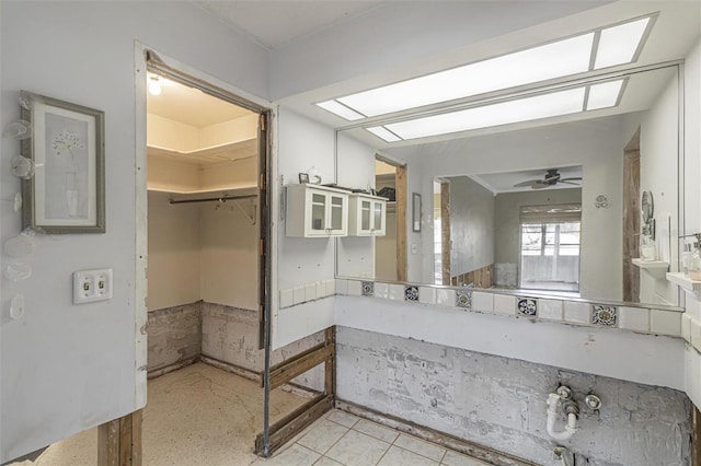 bathroom with ceiling fan