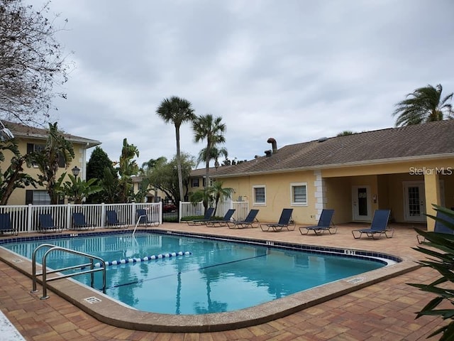 view of pool featuring a patio